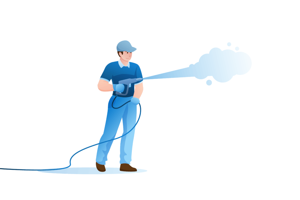 Man using a pressure washer to clean, demonstrating a key step in soft washing techniques. The image shows the worker in blue uniform, aiming the spray wand with water vapor visible.